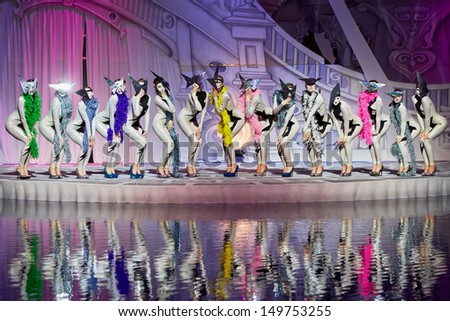 MOSCOW - JAN 5: Actors of musical show for children Through the Looking Glass pose on stage of Swimming Pool of Sports complex Olympyisky, January 5, 2013, Moscow, Russia.