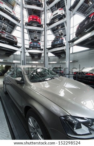 Moscow - Jan 11: Volkswagen Passat In The Center Of The Multi-Story Automated Car Parking System In The Tower To Store Cars In Volkswagen Center Varshavka On January 11, Moscow, Russia