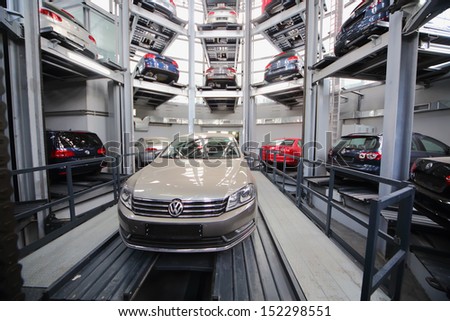 MOSCOW - JAN 11: Cars Volkswagen in the tower for storage and presentation in Varshavka Center on January 11, 2013, Moscow, Russia. The tower was designed and built in 2009