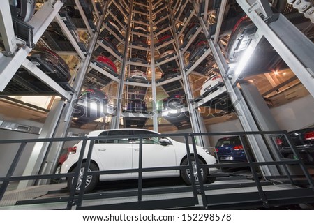 MOSCOW - JAN 11: Bottom view of the Volkswagen Golf on parking lot with a multi-story automated car parking system in Volkswagen Center Varshavka at night on January 11, 2013, Moscow, Russia