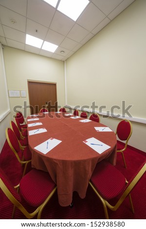 Modern empty conference room with a red carpet on the floor