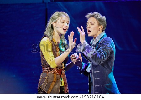 MOSCOW - DEC 15: Actors sing a duet in scene from musical spectacle for children Treasure Island on stage at Big Concert Hall Izmailovo, December 15, 2012, Moscow, Russia.