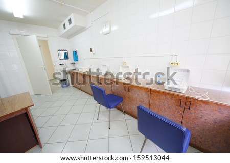 Empty cabinet for inhalation with three inhalers and a table