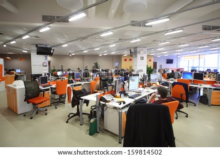 MOSCOW - MAR 5: Employees work in office buildings news agency RIA Novosti with orange furniture on March 5, 2013 in Moscow, Russia.