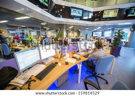 Moscow - Mar 5: Office Buildings News Agency Ria Novosti With Many Screens With News On March 5, 2013 In Moscow, Russia.