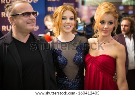MOSCOW - MAY 25: Vladimir Presnyakov Jr. with wife Natalie Podolsky and friend on Russian Music Award channel RUTV in Crocus City Hall on May 25, 2013 in Moscow, Russia.