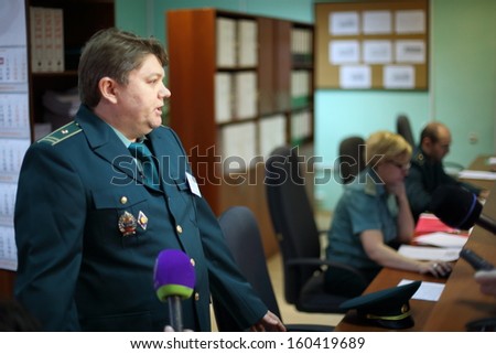 MOSCOW - FEB 28: Customs officer with marks of distinction gives interview in Kiev customs house on February 28, 2013 in Moscow, Russia.