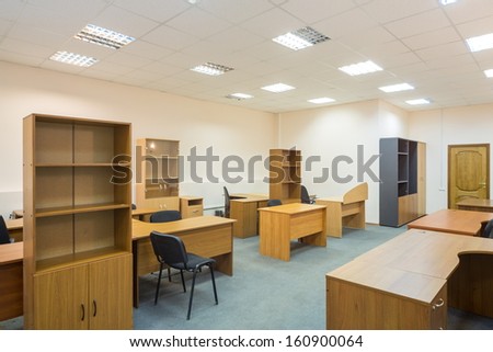 Office room with empty furniture