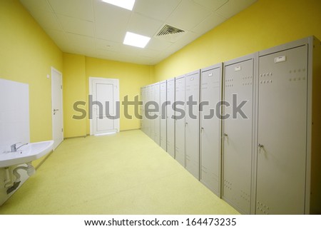 Lockers for class physical education in empty room in school.