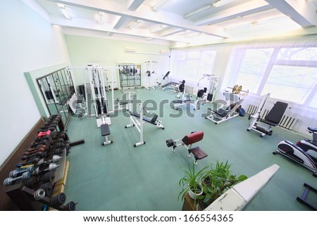 Top View On Spacious Empty Gym With Special Equipment For Physical Training