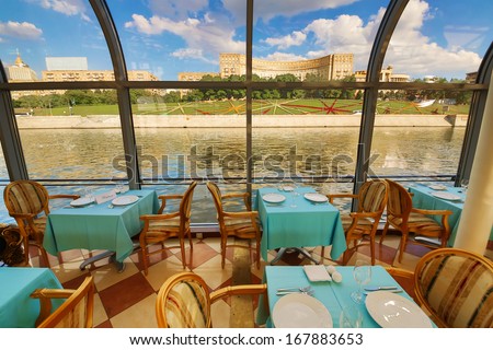 MOSCOW - AUG 13: View from the window of the floating Restaurant River Palace on the beautiful building and blue sky on August 13, 2013 in Moscow, Russia.