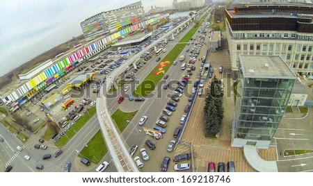 Roads of highways and railway with electric train near the telecentre, view from unmanned quadrocopter.