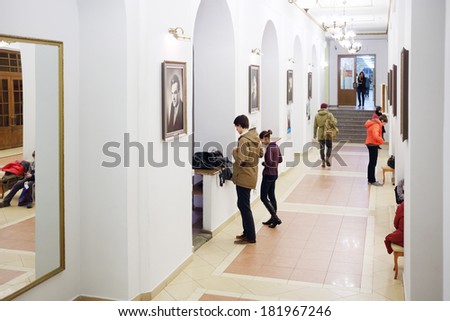 MOSCOW, RUSSIA - NOV 21, 2013: Students in hallway of Russian State University of Cinematography. First in world state film school was founded in 1919 in Moscow.