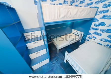 Beautiful modern children bedroom with bunk beds.