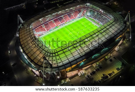 MOSCOW - OCT 21: Night view from unmanned quadrocopter to Lokomotiv Stadium with football players and spectators on October 21, 2013 in Moscow, Russia.