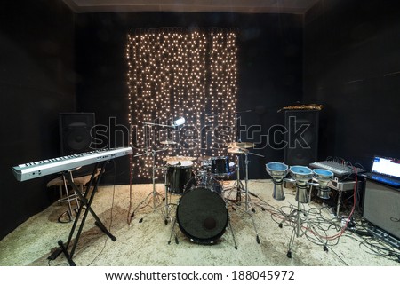 Studio room with musical instruments and record equipment