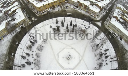 RUSSIA, SAMARA - JAN 7, 2014: Top aerial view to round Freedom Square with Lenin monument in winter.