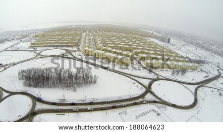 RUSSIA, SAMARA - JAN 5, 2014: Aerial view to Koshelev project with identical houses near superstore Mega.