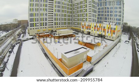 MOSCOW, RUSSIA - NOVEMBER 23, 2013: Colored buildings and and kindergarten of apartment complex Bogorodskiy, aerial view. The complex is an ensemble of 11 buildings