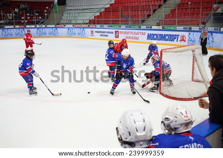 MOSCOW, RUSSIA - APR 26, 2014: Competition on hockey among children at the Ice Palace of Sports Sokolniki