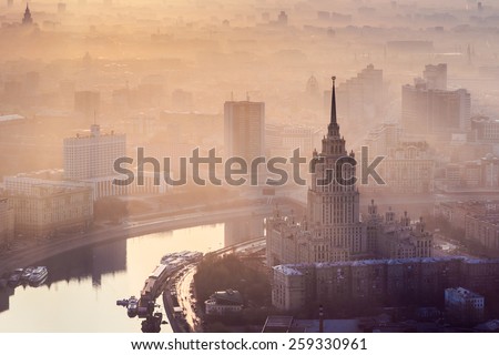 Sunrise in the foggy day over Moscow. Hotel Ukraine, Moskva river, building of Russian Government
