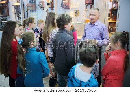 MOSCOW - APR 05, 2014: Group of schoolchildren on the excursion in the Museum of the History telephone in Moscow