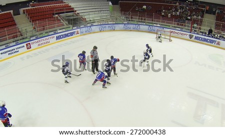 MOSCOW, RUSSIA - APR 26, 2014: Teams of children playing hockey at the Ice Palace of Sports Sokolniki, aerial view