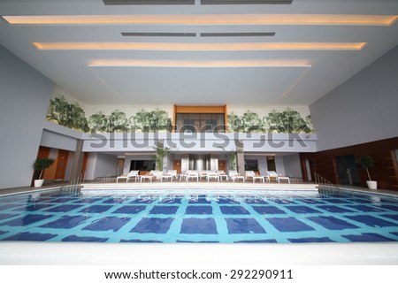 SOCHI, RUSSIA - JUL 27, 2014: Room with an indoor pool and sun loungers in the Hotel Radisson Blu Paradise Resort and Spa