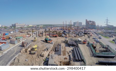 MOSCOW - MAY 25, 2015: Construction site of MKZD North-Eastern Tunnel near Shelkovskoe highway with city traffic at spring sunny day. Aerial view