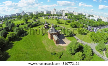 MOSCOW - JUN 06, 2015: Museum of Wooden Architecture in Kolomenskoe district during open air holiday Times and Epochs at summer sunny day. Aerial view