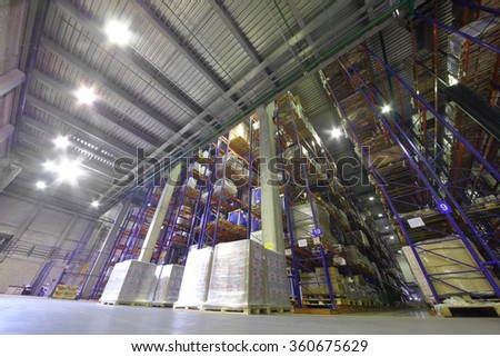 large warehouse with tiered storage of printing products in typographic complex