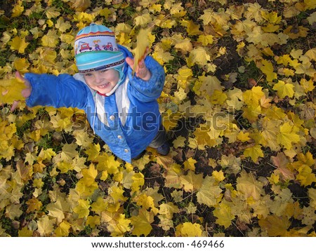 child throw leaves