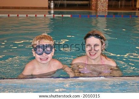 mother with child in covered pool