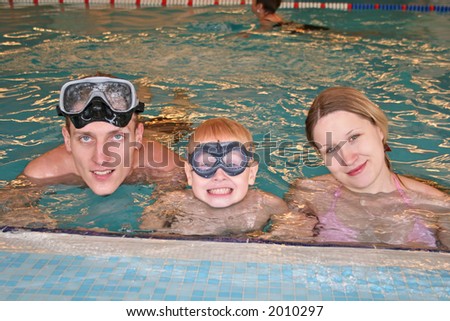 family in covered pool