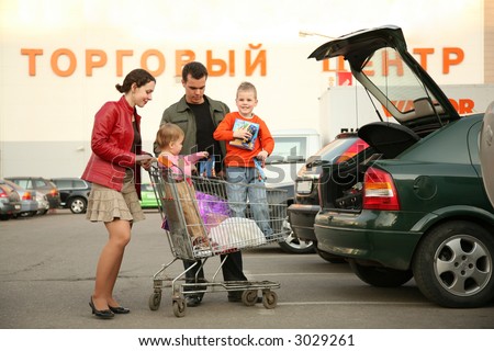 family on shop parking 3