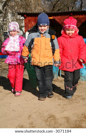 boy with girls in kindergarten