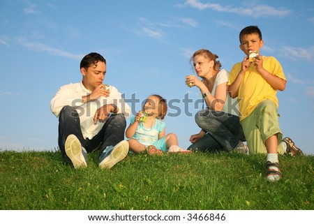 drinking family grass sky
