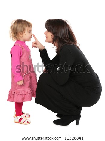 Mother touchs daughter\'s nose