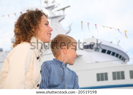 Mother, son and white ship