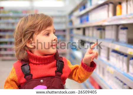 girl  in shop of household cosmetics