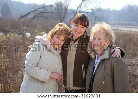 Women of three generations of one family, spring outdoor