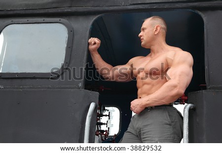athlete in locomotive cabin door