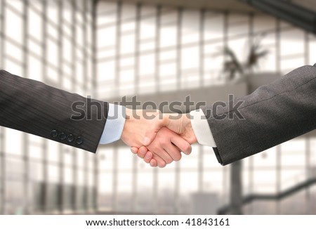 Wrists And Hands. stock photo : shaking hands with wrists in hall of business center