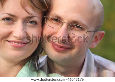 faces of happiness man and woman. man and woman are cuddling