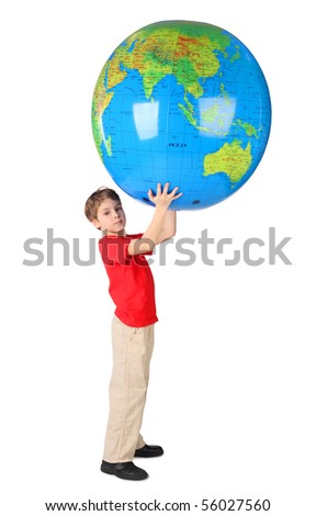 boy in red shirt holding big inflatable globe over his head side view isolated
