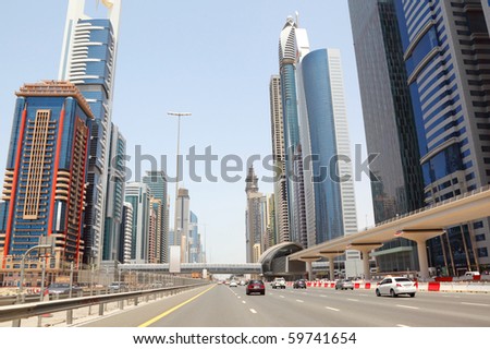 DUBAI - APRIL 18: General view on trunk road and skyscrapers on April 18, 2010 in Dubai, UAE. Dubai is the most fast-growing city on the Earth.