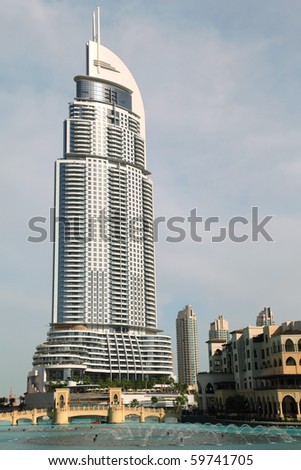 DUBAI - APRIL 17: Burj Dubai Lake Hotel and other buildings near water, sunny day, April 17, 2010 in Dubai, UAE