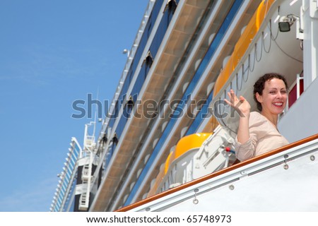 Smiling girl on ladder goes to the big cruise ship and wave by hand