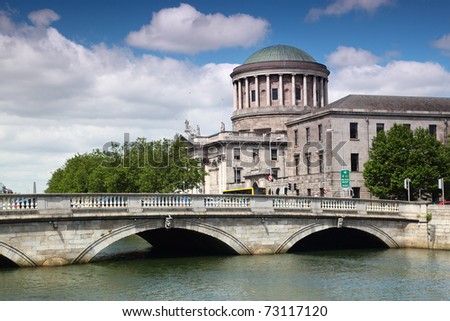 O\'Donovan Rossa Bridge and Four Courts, river Liffey in Dublin, Ireland
