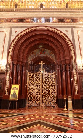 Patterned gilt door in arch inside Cathedral of Christ the Saviour in Moscow, Russia